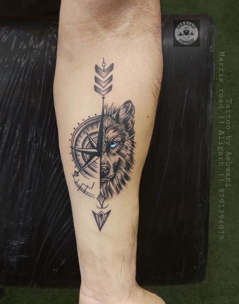 Wolf with compass tattoo Tatos Men Arm, Wolf With Compass Tattoo Design, Tattoo Ideas For Men Strength, Wolf Compass Tattoo Design, Meaningful Forearm Tattoo For Men, Wolf And Compass Tattoo, Lion And Compass Tattoo, Boys Tattoo Ideas, Tattoo Ideas Boys