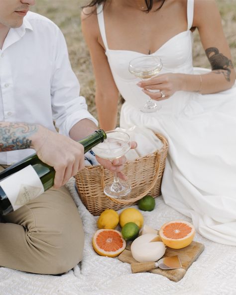 Picnic date at your engagement session? I’ll be there! 🍊🥂🍋 Wine Picnic Engagement Photos, Picnic Prenup Photoshoot, Engagement Photos Picnic Ideas, Pre Wedding Picnic Photoshoot, Cheers Engagement Photos, Picnic Couple Ideas, Engagement Picnic Photos, Engagement Photo Picnic, Beach Picnic Engagement Photos