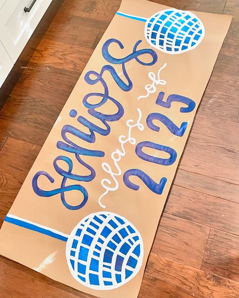 Shoutout to my seniors!! 💙🪩✨ Senior Banner Ideas, Craft Paper Banner, Senior Poster Ideas, Homecoming Banner, Spirit Posters, Painted Banners, School Spirit Posters, Senior Posters, Senior Banner