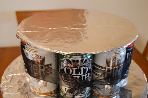 How To Make A Beer Can Cake Tower, Beer Bottle Birthday Cake, Diy Beer Cake With Cans, Beer Can Cakes For Men Diy, Beer Bottle Cakes For Men, Beer Tower Cake For Men, Beer Can Cake Tutorial, How To Make A Beer Cake, How To Make A Beer Cake With Cans