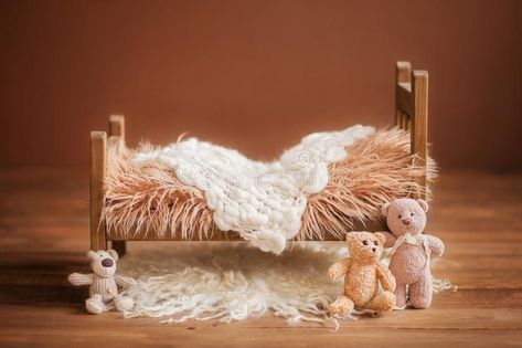 Cot for a newborn on a brown background with toys and a white rug, background stock photography Rug Background, Garden Portrait, Studio Background Ideas, Newborn Background, Baby Photography Backdrop, Baby Shower Background, Baby Boy Newborn Photography, Baby Backdrop, Foto Newborn