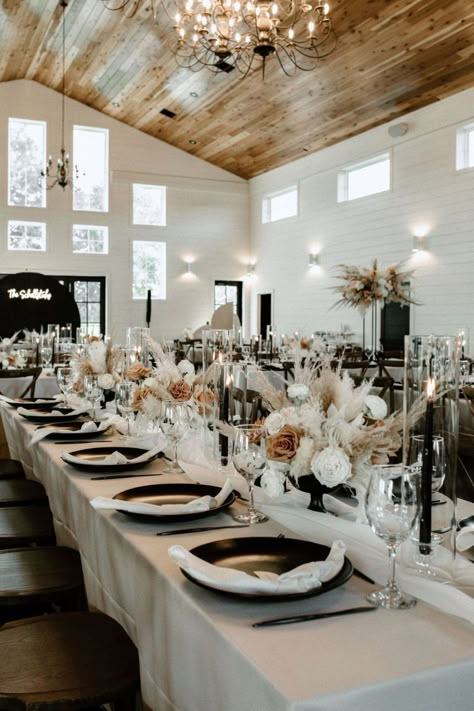 Black White And Brown Wedding Decor, White Tan And Black Wedding, Black Farmhouse Wedding, Black White Rust Wedding, Black White And Amber Wedding, Black Table Linens Wedding Boho, Black White And Champagne Wedding Reception, Black And White Modern Boho Wedding, Neutral Wedding With Black Accents