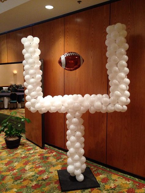 Balloon football goal post....Touchdown! Balloon Football Goal Post Diy, Balloon Field Goal Post, Parade Float Football Theme, Goal Post Balloon Arch, Balloon Football Goal, Balloon Goal Post, Football Goal Post Balloons, Football Game Decorations, Football Parade Float Ideas