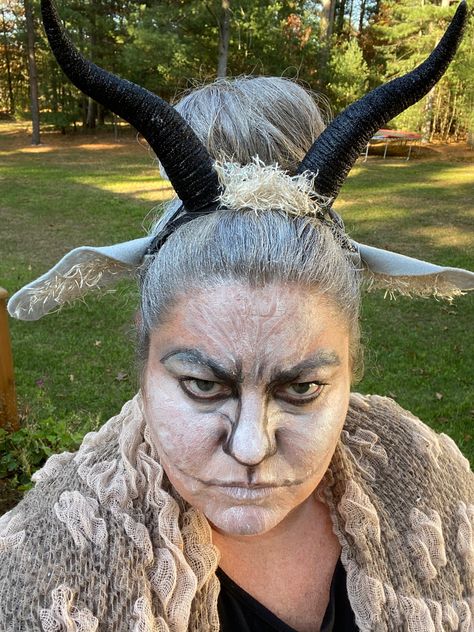 Silver hairspray, headband with felt goat ears, fur and horns hot glued on with some creepy old goat makeup. #halloween #costumes #diyhalloweencostumes #oldgoat #goat #funnyhalloweencostumes #thedeckerator Goat Halloween Costume, Goat Cosplay, Goat Makeup, Capricorn Costume, Felt Goat, Sound Of Music Broadway, Halloween Hats Diy, Faun Makeup, Goat Ears