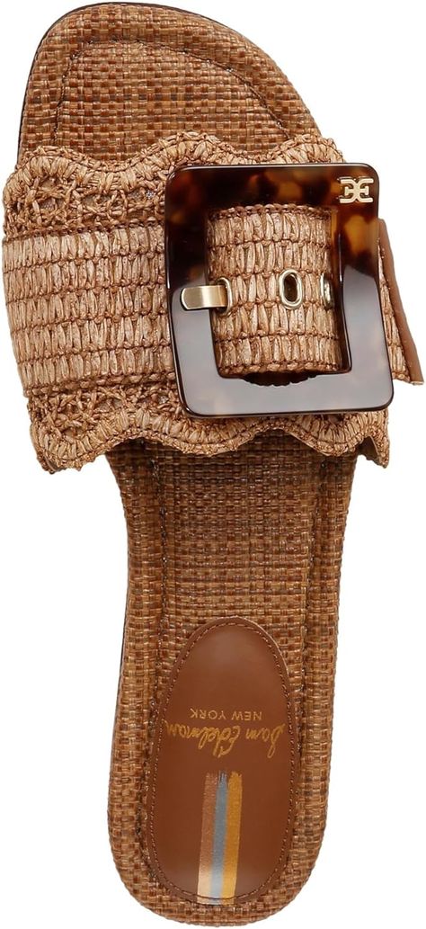 Sam Edelman Bambi The Bambi slide sandals boast a raffia upper complemented by an oversized resin buckle. Play with proportion and pack a punch. Heel Height: 0.5 Inches Closure: Slip-On Sam Edelman Sandals, Fancy Shoes, Woven Raffia, Girly Shoes, Perfume Gift Sets, Fabric Gift Bags, Sandal Women, Sandals Summer, Sam Edelman