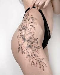 Tattoo Under Chest, Butterfly Thigh Tattoo, Side Tattoos Women, Side Thigh Tattoos, Rose Tattoo Thigh, Flower Tattoo On Side, Bum Tattoo, Ribbon Tattoos, Beautiful Flower Tattoos