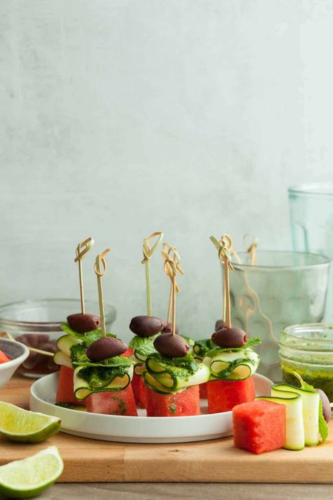 Sweet watermelon and crisp cucumbers make these watermelon skewers with minty lime oil a simple and refreshing summer appetizer. Watermelon Skewers, Watermelon Appetizer, Vegan Apps, Skewer Appetizers, Sweet Watermelon, Mint Oil, Grain Free Granola, Lime Oil, Watermelon Salad