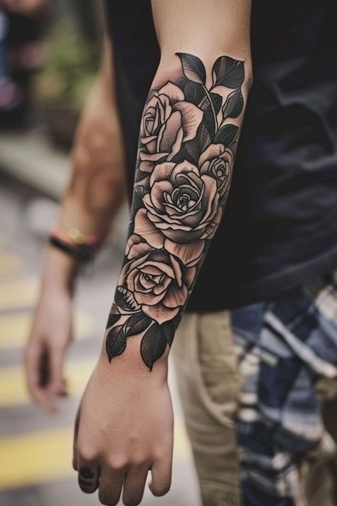 Explore the best meaningful forearm tattoo ideas for men with designs that carry deep significance. Rose Garden Tattoo Sleeve, Forearm Flower Tattoo Men, Floral Tattoo For Men, Forearm Filler Tattoo, Mens Floral Tattoo, Tattoo Ideas For Men Meaningful, Outer Forearm Tattoo Men, Forearm Tattoo Ideas For Men, Girly Hand Tattoos