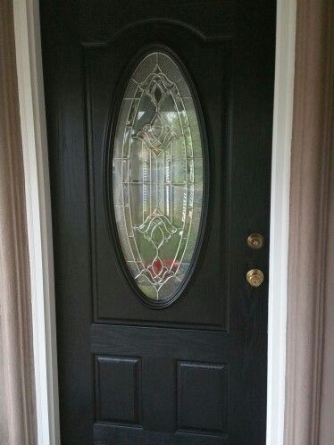 Black front door. Gorgeous! Black Front Door With Window Panes, Black Front Door Oval Window, Goth Front Door, Front Door Oval Glass Window, Front Door With Oval Glass Window, Front Door With Oval Window, Oval Window Front Door, Black Fromt Door, Oval Glass Front Door