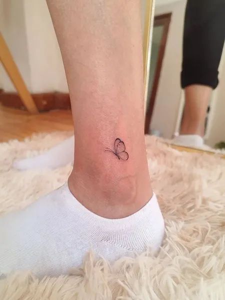 Butterfly Ankle Tattoo Mini Butterfly Tattoo Ankle, Small Butterfly Ankle Tattoo, Small Leg Tattoos Women Ankle, Butterfly Ankle Tattoos For Women, Ankle Butterfly Tattoo, Butterfly Tattoo On Ankle, Butterfly Tattoo On Foot, Butterfly Tattoo Ankle, Mini Butterfly Tattoo