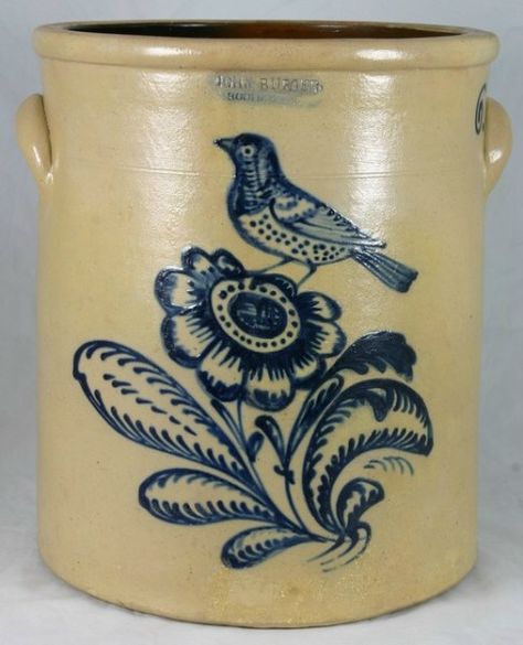 JOHN BURGER ROCHESTER NY 6 gallon crock. This great design speaks for itself, a combination of their artistic bird and large sunflower design.  Old Professional restoration to hairline thru the design and other short hairlines at the rim on the front. The handles are replaced. 15" 1855. sold for $10000 on 9/09. Rustic Antique Decor, Antique Stoneware Crocks, Antique Jug, Antique Crocks, Old Crocks, Collectible Pottery, Stoneware Crocks, Old Pottery, Antique Stoneware