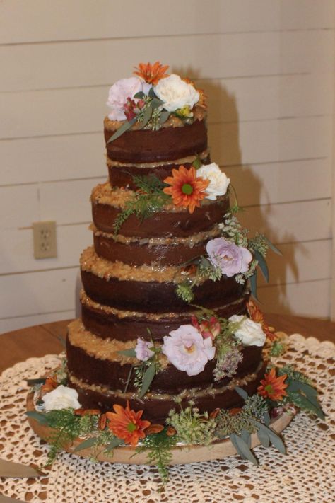 Naked German chocolate wedding cake German Chocolate Wedding Cake Ideas, German Chocolate Birthday Cake Decorated, German Chocolate Wedding Cake, Chocolate Wedding Cake Rustic, Grooms Cake German Chocolate, Chocolate Wedding Cake 2 Tier, Frozen Wedding, Chocolate Wedding, Wedding Food Drink