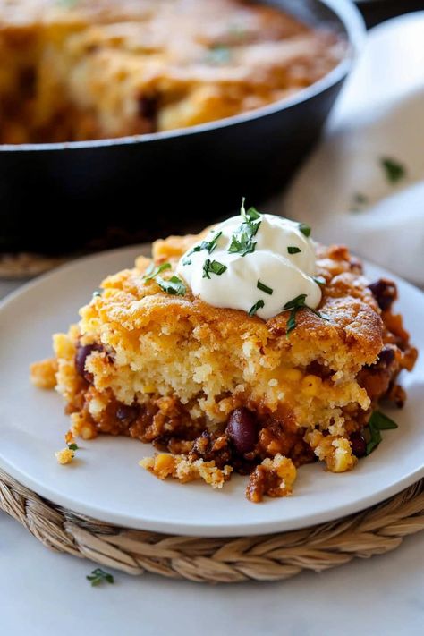 Warm up with this chili cornbread casserole! It's a hearty, one-pan meal with plenty of spice that's perfect for chilly nights at home. Chili Casserole Cornbread, Mexican Casserole With Cornbread, Chili Casserole Recipes, Cornbread Chili Casserole, Chili With Cornbread, Cornbread Chili, Chili Cornbread Casserole, Chili Cornbread, Chili Casserole