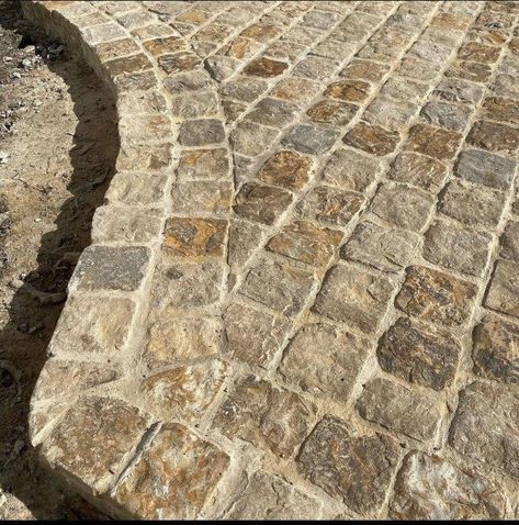 Hackett Brown Cobbles | Natural Cobblestone Pavers | PBM Curved Cobblestone Path, Cobble Stone Patio Ideas, Cobble Stone Driveway Entrance, Cobbled Patio, Rustic Pavers, Cobble Stone Pavers, Edging Garden Beds, Courtyard Pavers, Cobble Path