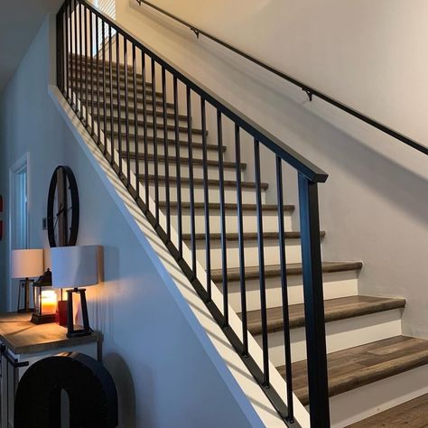 Modern Metal Railings | Ornamental Iron Railings | Get Free Estimate Black Steel Stair Railing, Black Metal Banister, Modern Loft Railing Ideas, Black Indoor Railing, Interior Metal Railing, Indoor Metal Stair Railings, Modern Metal Stair Railing, Iron Staircase Railing Modern, Modern Railing Indoor