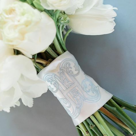 ✨Wedding Tip Wednesday✨ Hello brides-to-be! 💗 For this Wedding Tip Wednesday, let's talk about the details of your bouquet! 💐 Add a personal and elegant touch by wrapping a monogrammed ribbon cover on your bouquet stems! Choose a ribbon that matches your wedding colors and design a monogram with your initials. You can order a custom ribbon or DIY it with fabric paints or embroidery. Wrap the ribbon around your bouquet stems and for extra elegance, add charms, lace, or greenery. This simpl... Monogram Bouquet Wrap, Wedding Bouquet Ribbon, Elegant Wedding Bouquets, Diy Monogram, 2025 Wedding, Ribbon Bouquet, Wedding Initials, Custom Ribbon, Bouquet Wrap