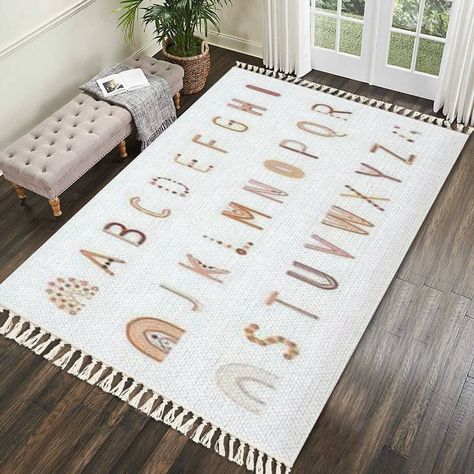 PRICES MAY VARY. Ideal Decor Size: The woven rug size is 5 x 8 feet (60" W x 96" L). Materials & Craft: This tightly woven rug features cotton blended with linen to create a classic design that never goes out of style. skin-friendly, soft and comfortable, durable, and breathable, can be used in all seasons. This woven fringe rug is meticulously stitched around the edges, so you can use them with confidence. Excellent Practicality: Lay flat, designed to resist everyday wear-and-tear. Ideal for Ch Neutral Toddler Bedroom, Safari Playroom, Boho Alphabet, Nursery Rugs Girl, Kid Rug, Alphabet Nursery Decor, Rug With Tassels, Playroom Mats, Kids Bedroom Rugs