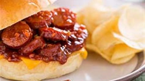 A tangy, sweet and rich sauce makes these dinner sandwiches the perfect way to complete your weeknight meal. Cubanos Sandwich, Smoked Sausage Sandwich, Sausage Sandwich Recipes, Sausage Skillet Recipe, Sausage Sandwich, Sausage Recipes For Dinner, Vietnamese Sandwich, Italian Beef Sandwiches, Breakfast Sandwich Maker