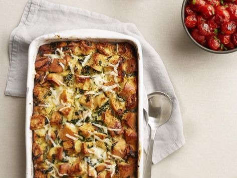 Get Caramelized Onion, Spinach and Gruyere Strata with Sauteed Cherry Tomatoes Recipe from Food Network Sauteed Cherry Tomatoes, Cherry Tomatoes Recipe, Mini Frittata, Savory Bread Puddings, Cherry Tomato Recipes, Tomatoes Recipe, Gratin Dish, Cheesy Casserole, Bobby Flay