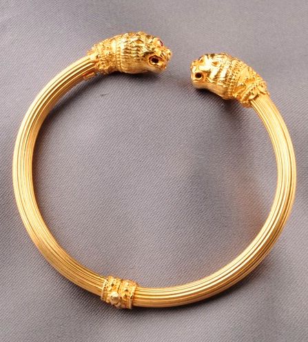 18kt Gold Lion's Head Bangle, the hinged, fluted bangle with lion's head terminals, ruby melee eyes, 16.7 dwt, interior cir. 6 1/2 in. Man Gold Bracelet Design, Gold Lion, Mens Gold Jewelry, Lion Face, Gold Designs, Bracelet Men, Bridal Gold Jewellery Designs, Boy Photo, Bracelet Design