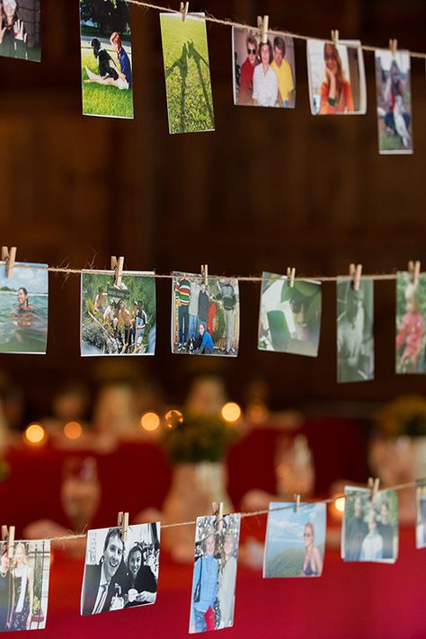 Photos of the bride and groom hung on natural twine with mini clothespins Embarrassing Photos, Photos Of The Bride, Wedding Touches, Lounge Reception, New England Wedding, Business Signage, Camp Wedding, Ideas Craft, Sign Company