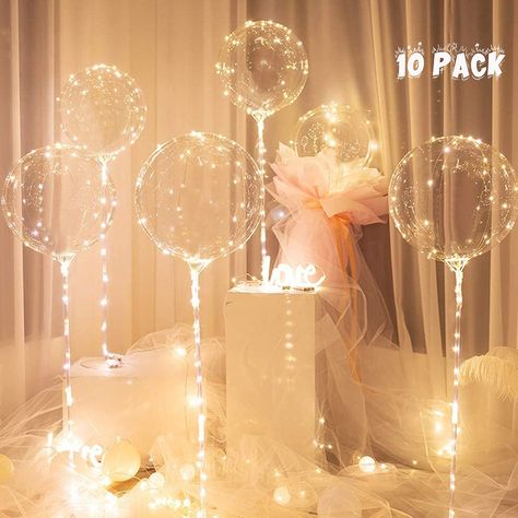 PRICES MAY VARY. CONTAINS: 12 Pieces of 20 inch balloon,10 Led Handles With Blinking, 10 sticks 70 cm(2x 35cm), 1 Air Pump Manual-BONUS LIGHT MODE 3 DIFFERENT FLASHING MODE HOW TO INFLATE: We recommend an electric air machine. Good To Use Any Occasion: Outdoor or Indoor , any Events, Birthday and Wedding Party, Christmas Celebrations 100% MONEY BACK GUARANTEE: If you don't absolutely love your balloons then we will refund your money WARNING: READ THE INSTRUCTIONS CAREFULLY, HOW TO INFLATE THE BA Photo Backdrop Birthday, Bobo Balloons, Light Up Balloons, Greenery Wedding Decor, Transparent Balloons, Led Balloons, Up Balloons, Christmas Runner, Bubble Balloons