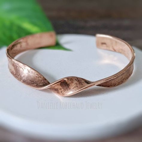 Check out this item in my Etsy shop https://www.etsy.com/listing/937028470/copper-cuff-bracelet-upcycled-copper Copper Bracelets Handmade, Cooper Bracelets, Smithing Projects, Hammered Copper Jewelry, Hammered Metal Jewelry, Metal Jewelry Handmade, Copper Jewelry Diy, Handmade Copper Bracelet, Hammered Copper Earrings