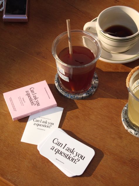 cafe afternoon drinks on a wooden table with sunset and can i ask you a question card game Trivia Aesthetic, Card Games Aesthetic, Card Game Aesthetic, Afternoon Aesthetic, Cafe Cards, Game Cafe, Game Aesthetic, Asian Cards, 2024 Aesthetic