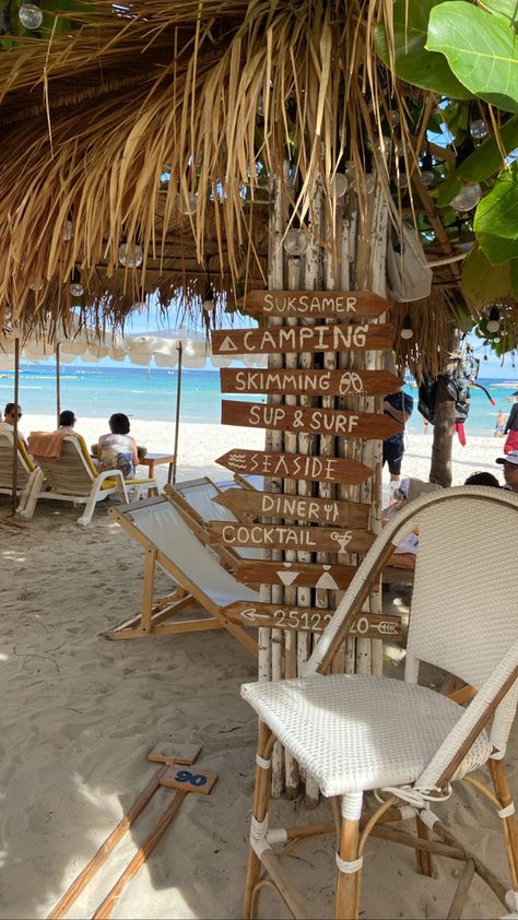 Beach signs with beach chair in neutral colors in a beach with clear blue waters in the background Pattaya Beach Aesthetic, Pattaya Thailand Aesthetic, Thailand Beach Aesthetic, Thailand Pics, Thailand Aesthetic, Beach In Thailand, Pattaya Beach, Thai Beach, Travel Instagram Ideas