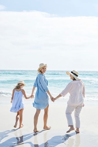 Mother, daughter and grandmother walking by the sea, rear view Outfit Ideas For Family Pictures, Grandmother Photography, Ideas For Family Pictures, Family Beach Pictures Poses, Mother Daughter Granddaughter, Generations Photography, Daughter Photo Ideas, Father Daughter Tattoos, Mother Daughter Pictures