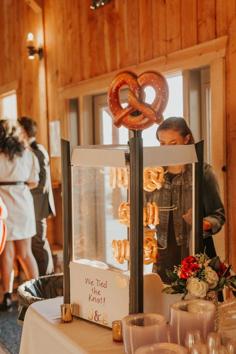 Pretzel Bar At Wedding, Pretzel Cart Wedding, Soft Pretzels At Wedding, Exit Station Wedding Food, Pretzel Station Wedding, Pretzels Wedding, Alternative Wedding Dessert Ideas, October Wedding Food, Pretzel Cocktail Hour