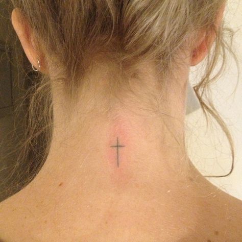 cross tattoo back of neck Dainty Tattoos Neck, Cross On Collar Bone Tattoo, Cross Back Tattoos For Women, Cross Tattoos For Women Neck, Cross Line Tattoo, Cross Back Of Neck Tattoo, Small Back Neck Tattoos, Cross On Back Of Neck, Cross Back Tattoo Women