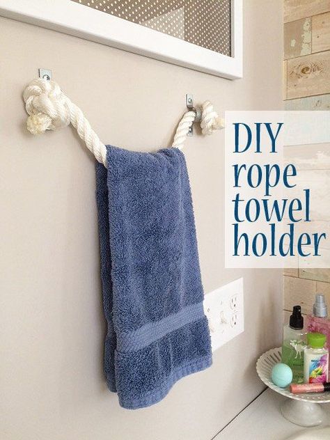 Make a nautical-style towel holder using rope and some industrial plumbing clips. So simple and unique! [media_id:3182031] I’m here to share how you can make a…                                                                                                                                                                                 More Diy Towel Holder, Mermaid Bathroom, Diy Towels, Beach Theme Bathroom, Nautical Bathrooms, Bathroom Themes, Bathroom Redesign, Room Redesign, Diy Bathroom Decor