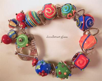 Flinstone Bead Bracelet: I make and sell individual lampwork glass focal beads on my website and sell sterling silver and lampwork jewelry at Art Festivals around the country. Lampwork Bracelets, Lampwork Focal Bead, Lampwork Jewelry, Focal Beads, Art Festival, Focal Bead, Make And Sell, Bead Bracelet, My Website