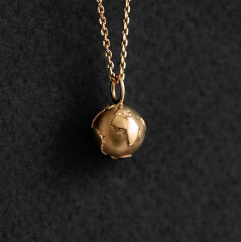 Pendant in the shape of the Earth reminds of what exactly is our home. You can choose to buy only pendant without chain or with gold chain of different length Dimensions: - diameter around 10 mm - material: gold 585 We have special conditions for purchasing of sets. You can save up to 15%. Please refer to the announcements on the main page for details. All items are packaged in moisture resistant packaging to ensure they arrive in perfect condition. Please read my shipping and policies tab (loca Afro Jewelry, Earth Necklace, Globe Necklace, Earth Jewelry, World Map Necklace, Gold Globe, Fingerprint Necklace, Map Jewelry, Pretty Jewelry Necklaces