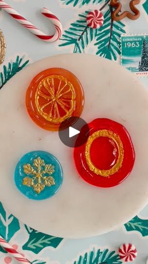 26K views · 3.6K reactions | Repost, but a good one!! (IMO 😅)

Our translucent wax reminds me SO much of Jolly Ranchers, I knew I HAD to try making seals with them. They take ALOT longer to melt, and it’s ALOT hotter than wax, so be really careful with it!! It’s probably not a craft for kids. Or maybe I’m just a worry wart, lol.

The paint is edible glitter mixed with vodka. I tried using water and it didn’t work at all, it globbed up and turned a greenish color 😅, but the vodka works great!!

This stamp, Susie Snowflake, also works well with another technique: the pour and scrape 🙌🏼 (For details on this process, see the tutorials in my highlights ✨) Because it’s shaped, it’s a great starter when learning the technique!! You can find it, and lots of other festive shaped stamps at Stric Worry Wart, Jolly Ranchers, Jolly Rancher, Edible Glitter, Craft For Kids, Winter Crafts, Cards Christmas, A Craft, Cold Winter