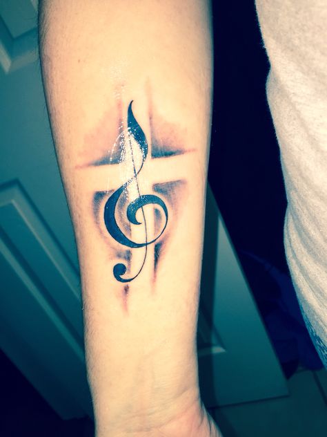 I want to share my new tattoo because it was so hard for me to find a cross/treble clef combo I really loved on the web. The artist did an awesome job bringing my vision to life! Clef Tattoo, Treble Clef Tattoo, Music Notes Tattoo, Tattoo Music, Tattoo Shading, Cross Tattoos For Women, Music Note Tattoo, Music Tattoo Designs, Wrist Tattoos For Guys