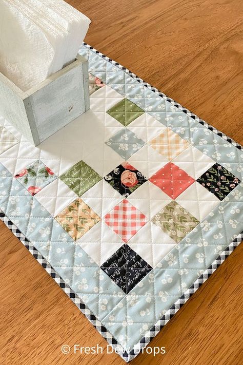 mini charm squares table runner quilt using scraps of jelly roll strips, easy mini charm squares quilt pattern Mini Charm Square Quilts, Mini Charm Pack Table Runner Patterns, Table Runner Sewing Patterns Free, Quilt As You Go Table Runner, Jelly Roll Table Runner Patterns Free, Mini Charm Pack Projects, Charm Pack Table Runner, Charm Pack Projects, Easy Placemats