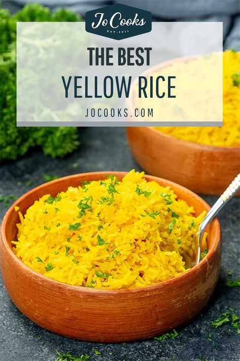 This light and fluffy 20 minute Yellow Rice is buttery, steamed in savory chicken broth, and seasoned with fragrant classic Spanish spices! #yellowrice #recipe Salvadorian Rice, Homemade Yellow Rice, How To Make Yellow Rice, Yellow Mexican Rice, Yellow Rice Recipe, Chicken And Yellow Rice, Yellow Rice Recipes, Rice Pilaf Recipe, Spanish Rice Recipe