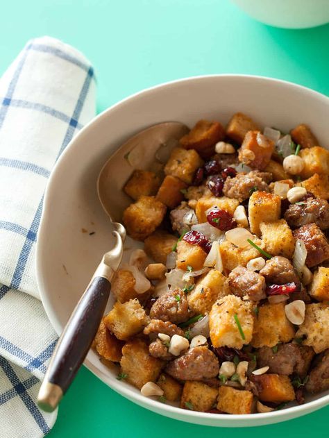 Sausage and Sage Stuffing with Dried Cranberries and Toasted Hazelnuts Sausage Sage Stuffing, Holiday Stuffing, Sage Stuffing, Hazelnut Recipes, Spoon Fork Bacon, Sage Sausage, Italian Sausage Recipes, Sweet Italian Sausage, Thanksgiving Meal