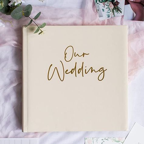 emember your wedding day with this beautiful and elegant wedding album. A fantastic wedding gift to store all of your beautiful photos, mementos, wedding memories and more. Understated and classic design, the perfect addition to your coffee table or bookshelf. Marriage Album, Album Pictures, Wedding Album Scrapbooking, Photo Album Scrapbook, Wedding Photo Album, Cream Wedding, Photo Store, Album Scrapbook, Beautiful Wedding Photos