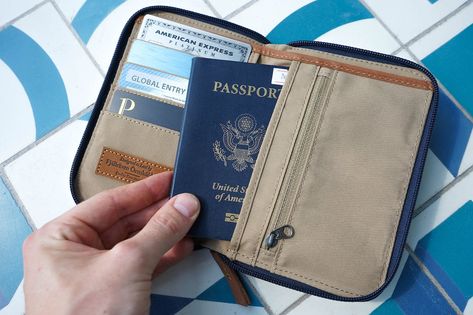 14 Travel Wallets for Your Next Trip | Best Travel Wallet | Pack Hacker American Express Platinum, Simple Wallet, Best Travel Accessories, Wing Shoes, Red Wing Shoes, Jean Pockets, Passport Wallet, Travel Wallet, American Leather