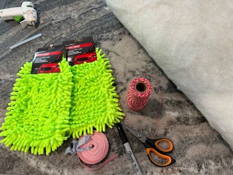 Grinch Cmas Tree, Diy Grinch Hand For Tree, Grinch Pillows Diy, Diy Grinch Centerpiece Ideas, Grinch Pool Noodle Ideas, Christmas Vacation Cat Rug Diy, Whoville Wreath Diy, Grinch Arm Diy, Grinch Jeans Diy