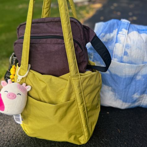 hello i got places to be 🏃‍♀️ ⇢ baggu standard fanny pack in raisin ⇢ baggu mini cloud in lemongrass ⇢ baggu carry on cloud in clouds #baggu #baggubag #wimb #whatsinmybag #baglovers @baggu #whatsinmybaggu #baggugirl #bagguandyou #baggubesties #bagguinuse #bagguinthewild #bagguraisin #baggulemongrass #bagguclouds Baggu Bag, Bag Styling, Baggu Bags, Places To Be, To Be, Aesthetic Fashion, Raisin, Fanny Pack, Fashion Bags