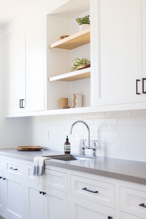 Open Shelves between closed cabinets Laundry room with open shelves between cabinets Open Shelves between closed cabinetry Open Shelves between closed cabinet #OpenShelves Shelves Between Cabinets, Beach House Modern, Island Beach House, Home Bunch, Laundry Room Shelves, Laundry Design, Sink Kitchen, New Kitchen Cabinets, Beach House Design