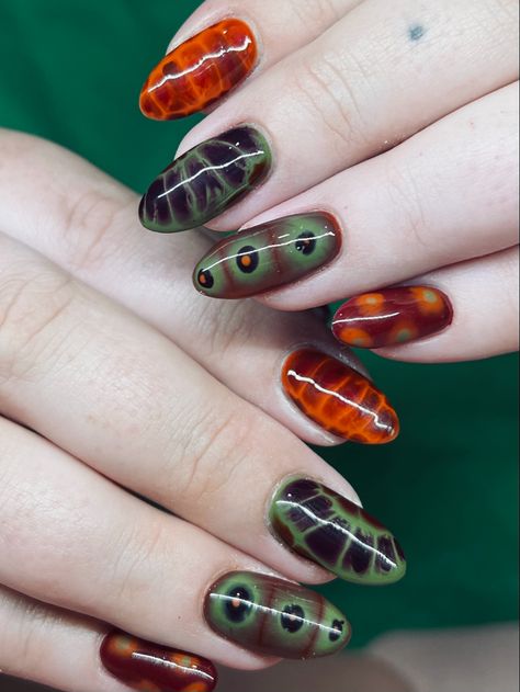 Funky Fall Nail Designs, Orange Brown And Green Nails, Green And Orange Fall Nails, Green Orange Fall Nails, Green And Orange Nail Designs, Fall Nails Blooming Gel, Funky Nails Almond, Maximalist Fall Nails, Fall Blooming Gel Nails