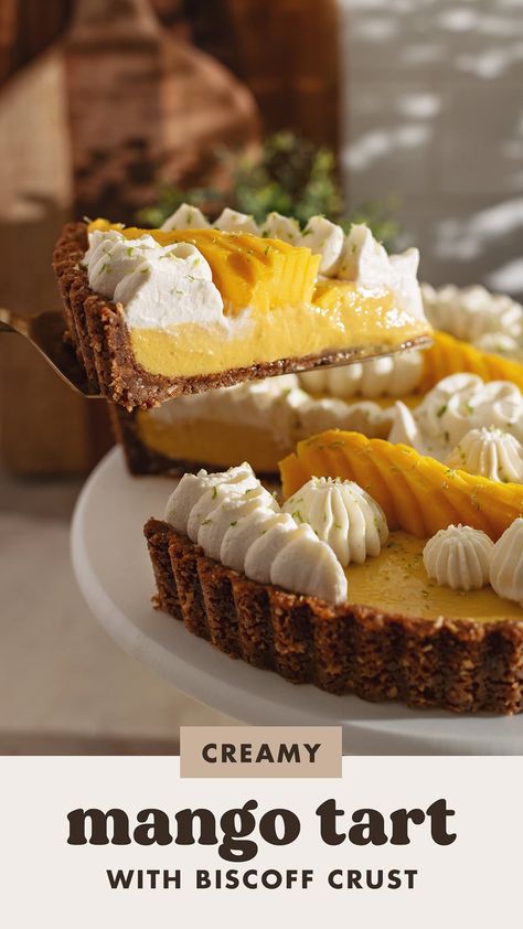 This tropical and delicious mango tart is made with a crunchy biscoff crust, creamy mango filling, and whipped cream and fresh mangoes on top. It's easy to make and perfect for mango season! #mangotart #mango #mangodessert | teakandthyme.com Dessert With Mango, Mango Whip, Mango Desert, Mango Pie Recipe, Mango Filling, Biscoff Crust, Baking Studio, Mango Curd, Mango Desserts