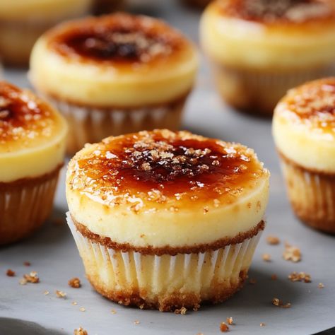 Imagine indulging in a dessert that marries the creamy richness of cheesecake with the elegant simplicity of crème brûlée. These Easy Crème Brûlée Cheesecake Cupcakes are exactly that—a delightful fusion Creme Brulee Cheesecake Cupcakes, Cream Brulee Cheesecake, Creme Brulee Cheesecake Bars, Carrot Cake Cheesecake Recipe, Cheese Cupcake, Creme Brulee Cheesecake, Peach Pound Cakes, Cheesecake Muffins, Carrot Cake Cheesecake