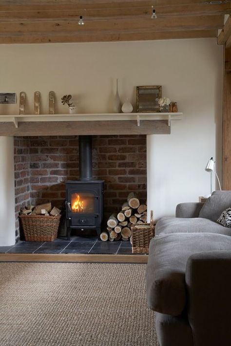 baskets, firewood, brick woodstove, mantle Oak Frame House, Cottage Decor Living Room, Fire Places, Log Burner, Lounge Ideas, Wood Burner, Fireplace Ideas, Cottage Living, Garden Cottage