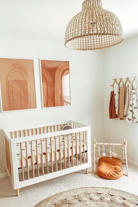 Terra cotta, rust, burnt orange — these gorgeous warm colors are bringing a whole new vibe to nursery designs.The earthy tones make for a striking color palette that is modern and even a bit bohemian. Cozy Baby Room, Baby Room Neutral, Nursery Room Design, Girl Nursery Room, Baby Boy Room Nursery, Baby Room Inspiration, Baby Room Design, Nursery Baby Room, Convertible Crib